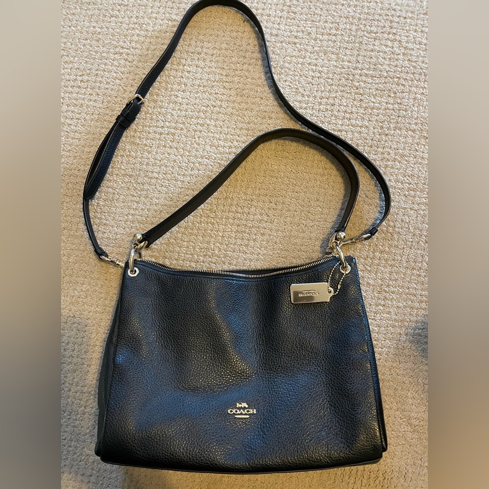 COACH MIA black leather bag.